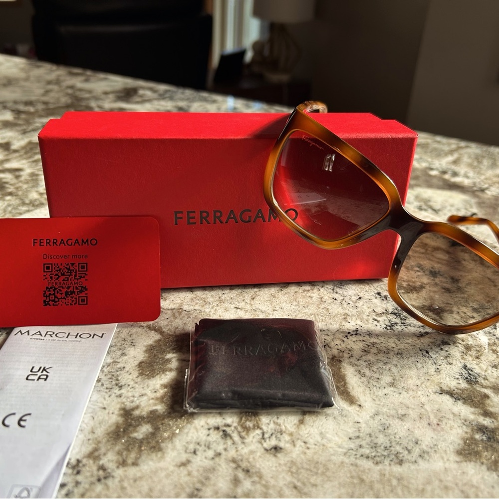 Brand new Ferragamo Sunglasses with box and case!